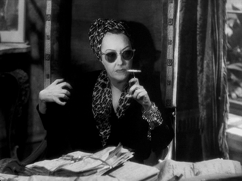 Gif of Gloria Swanson as Norma Desmond in "SunSent Boulevard"